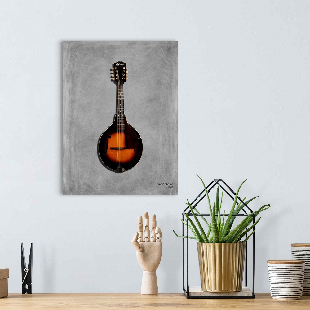 A bohemian room featuring Photograph of a Gibson Mandolin 1943 printed on a textured background in shades of gray.