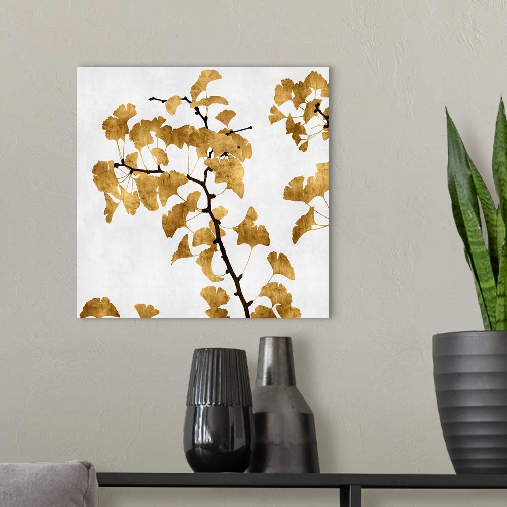A modern room featuring Silhouetted golden ginkgo leaves and brown branches on a white background.