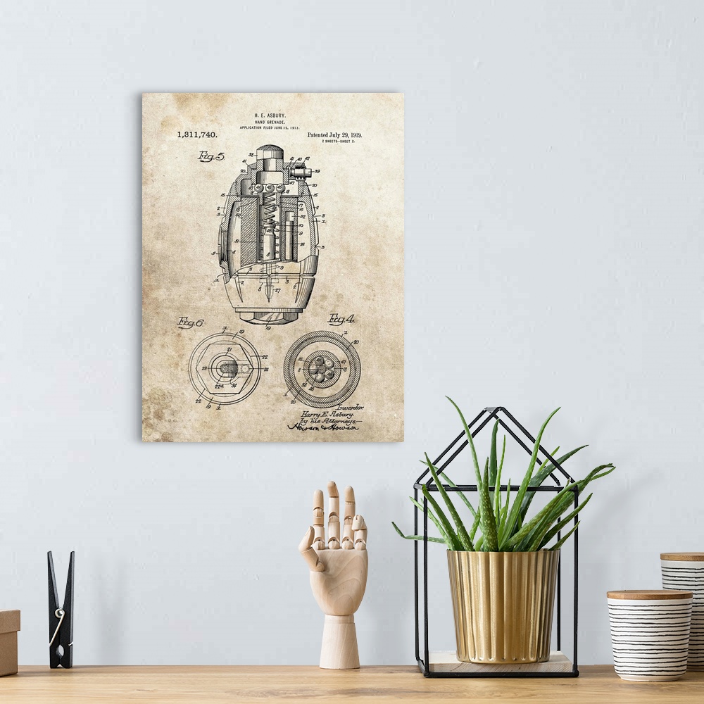 A bohemian room featuring Antique style blueprint diagram of a Hand Grenade printed on an aged background.