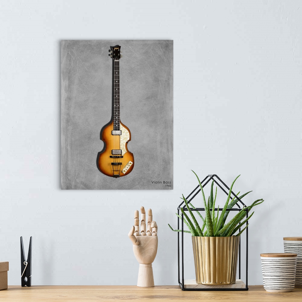 A bohemian room featuring Photograph of a Hofner Violin Bass 62 printed on a textured background in shades of gray.