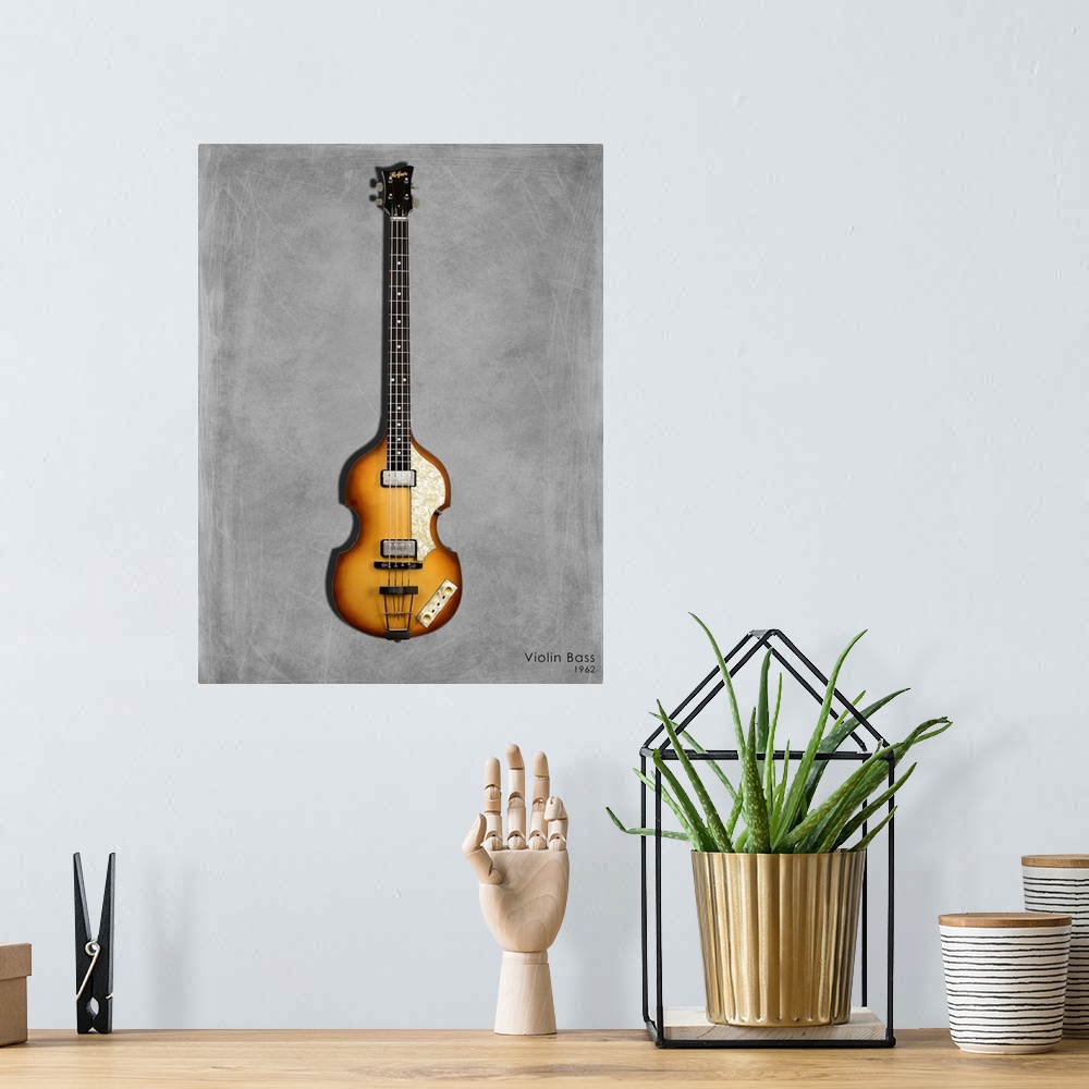A bohemian room featuring Photograph of a Hofner Violin Bass 62 printed on a textured background in shades of gray.