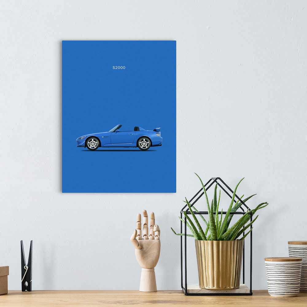 A bohemian room featuring Photograph of a blue Honda S2000 2009 with the hood down printed on a blue background