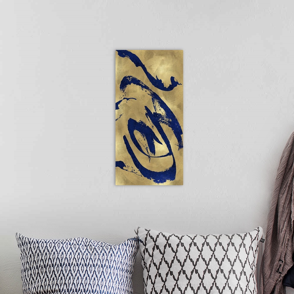 A bohemian room featuring Gestural and energetic brush strokes in blue decorate a mottled gold color background in this con...