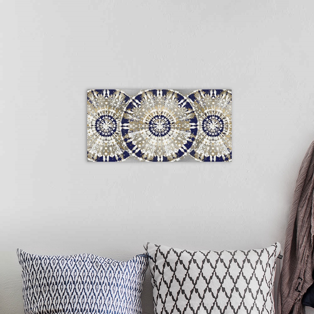 A bohemian room featuring Large abstract decor with three patterned, bohemian style circles overlapping in a row with blue,...