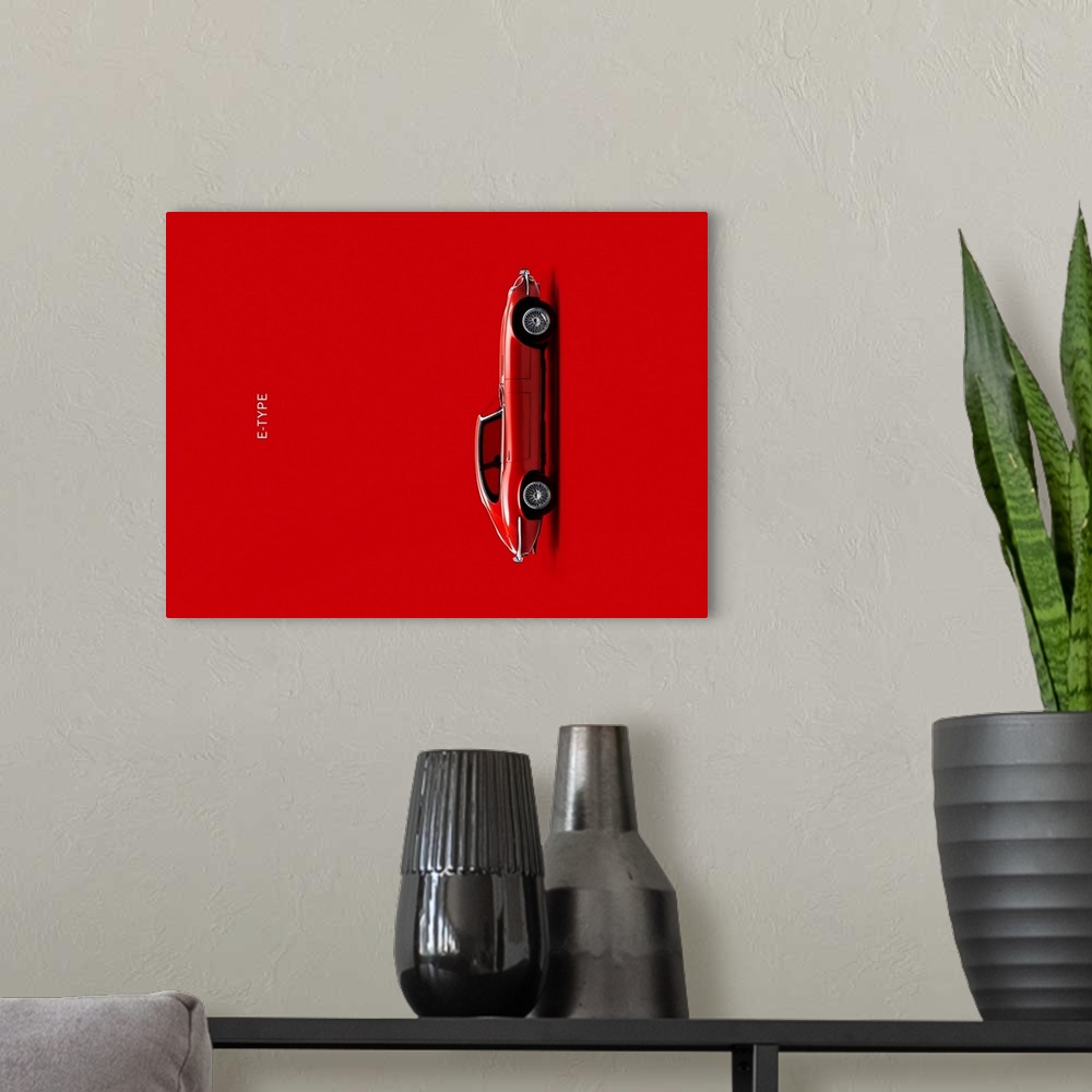 A modern room featuring Photograph of a red Jaguar E Type printed on a red background