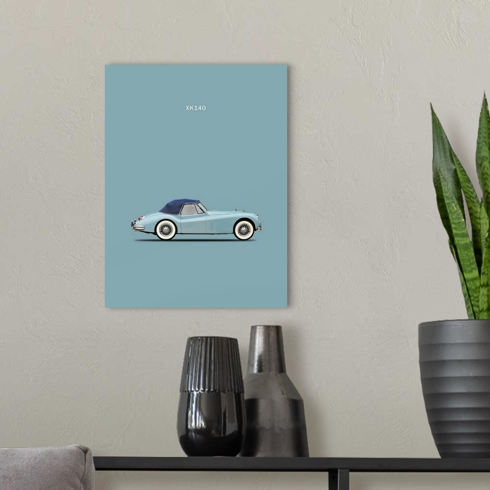 A modern room featuring Photograph of a light blue Jaguar XK140 with a dark blue top printed on a light blue background
