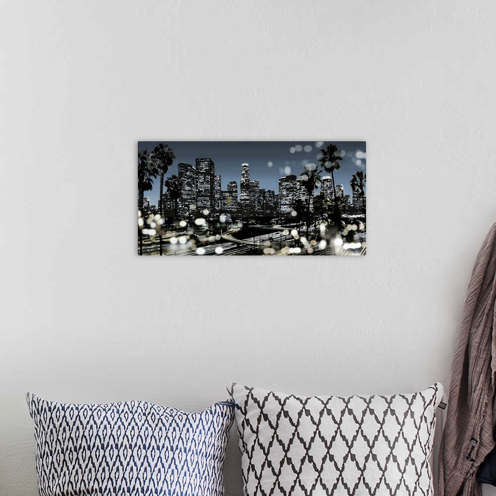 A bohemian room featuring Illustration of the Los Angeles skyline at night in black and white with a blue sky, palm trees i...