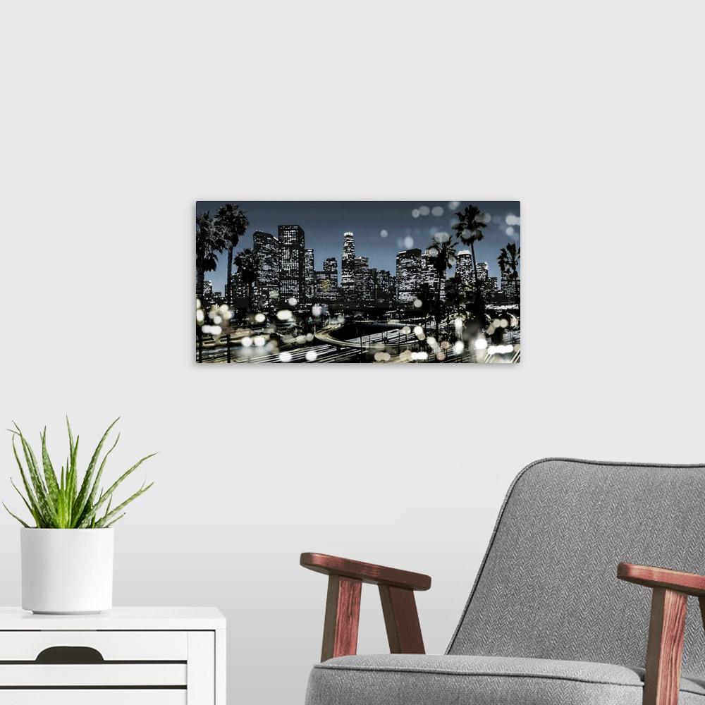 A modern room featuring Illustration of the Los Angeles skyline at night in black and white with a blue sky, palm trees i...