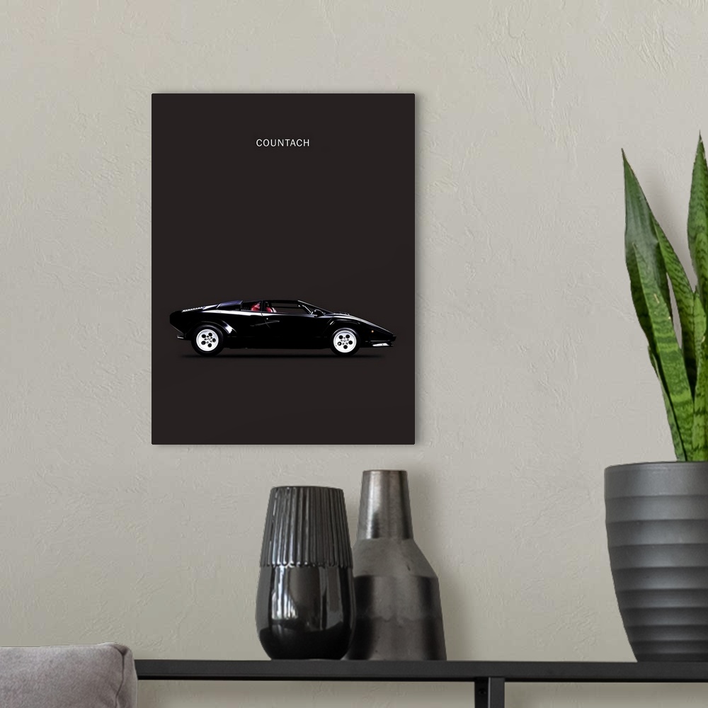 A modern room featuring Photograph of a black Lamborghini Countach 1984 with red leather seats printed on a black background
