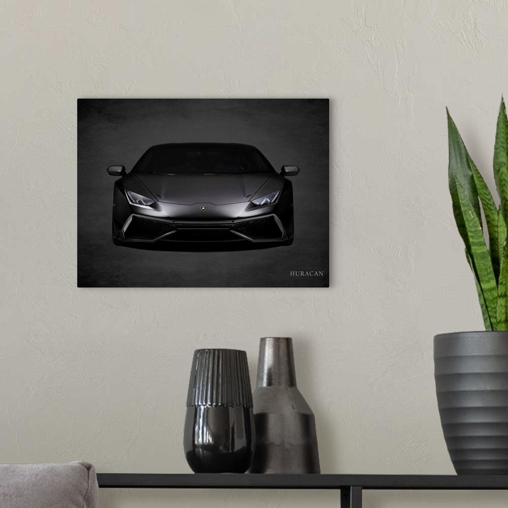 A modern room featuring Photograph of a black Lamborghini Huracan printed on a black background with a dark vignette.