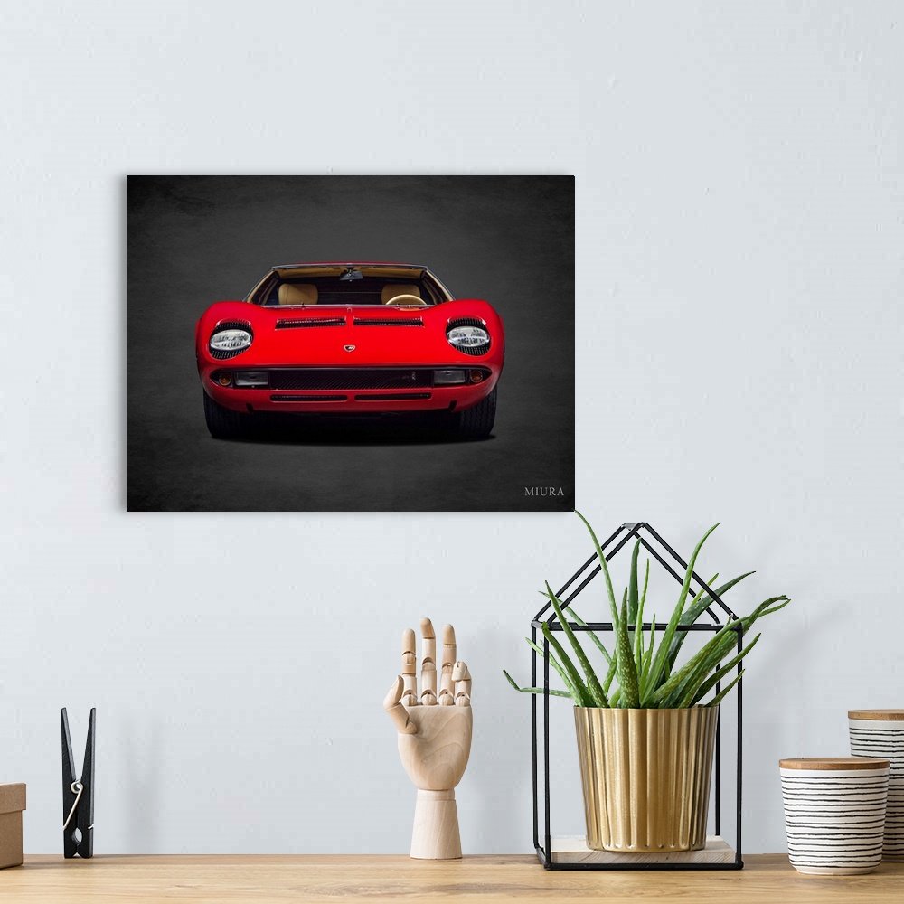 A bohemian room featuring Photograph of a red Lamborghini Miura printed on a black background with a dark vignette.