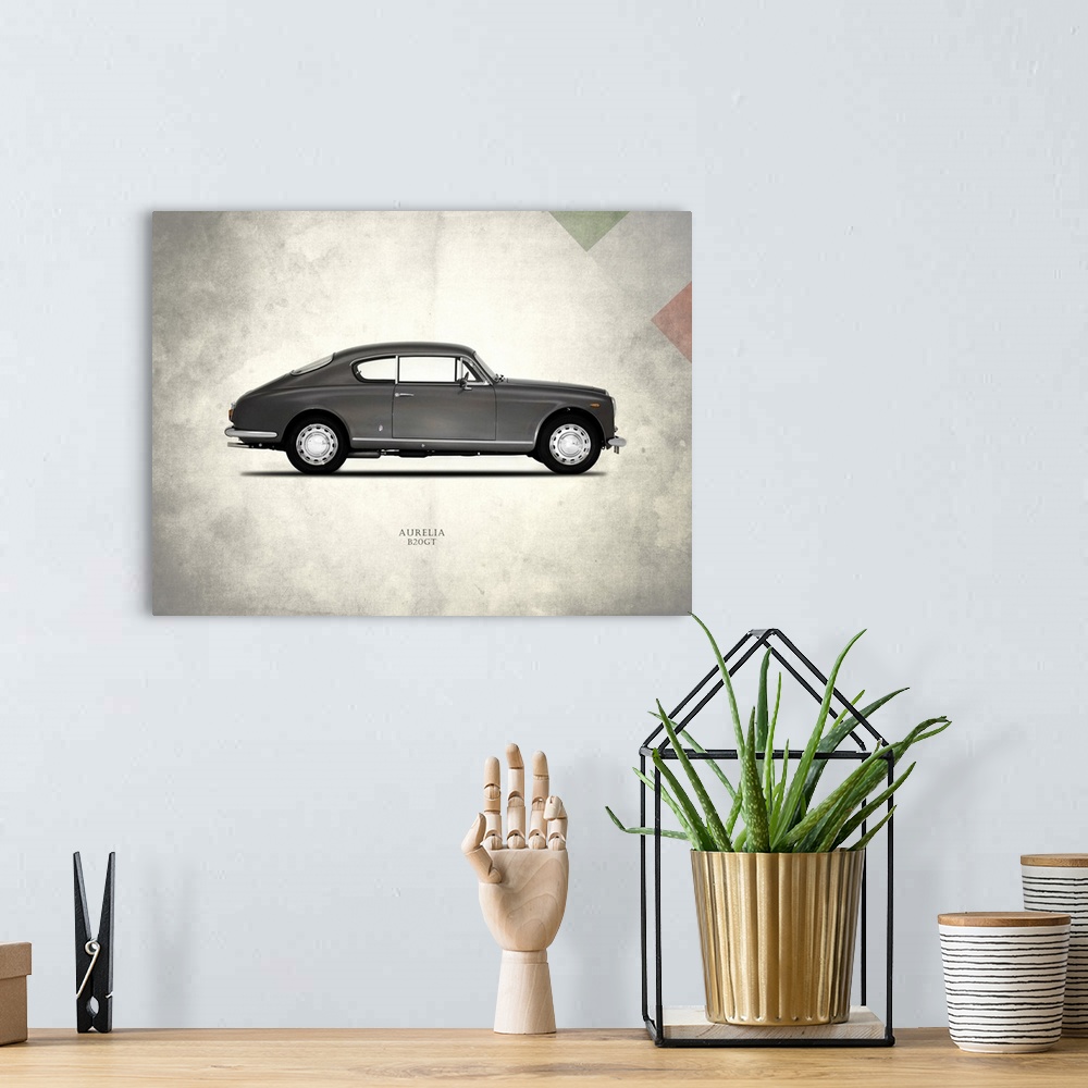 A bohemian room featuring Photograph of a Lancia Aurelia printed on a distressed white and gray background with part of the...