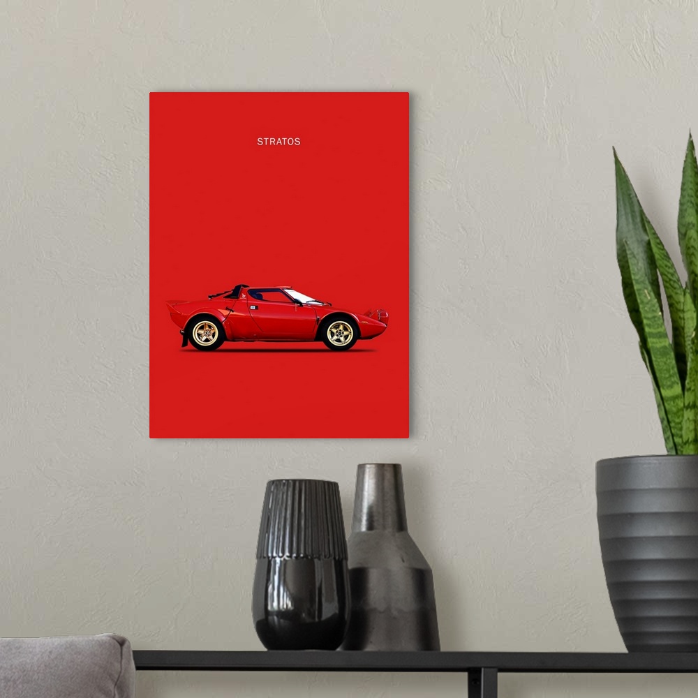 A modern room featuring Photograph of a red Lancia Stratos 1974 printed on a red background