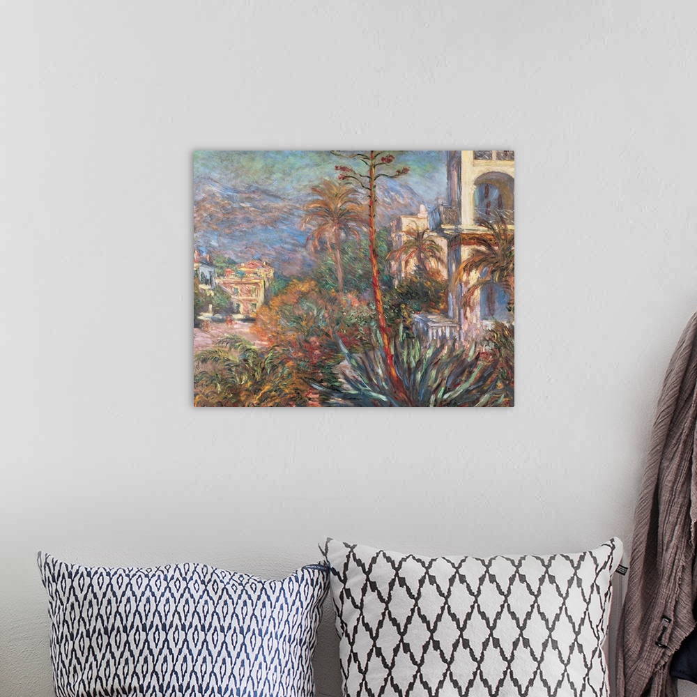 A bohemian room featuring The Villas in Bordighera by Claude Monet.