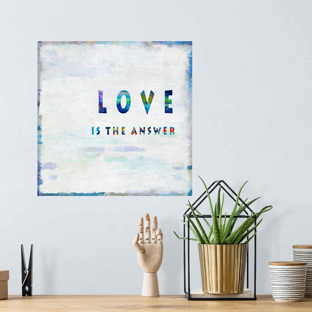 A bohemian room featuring "Love is the Answer"