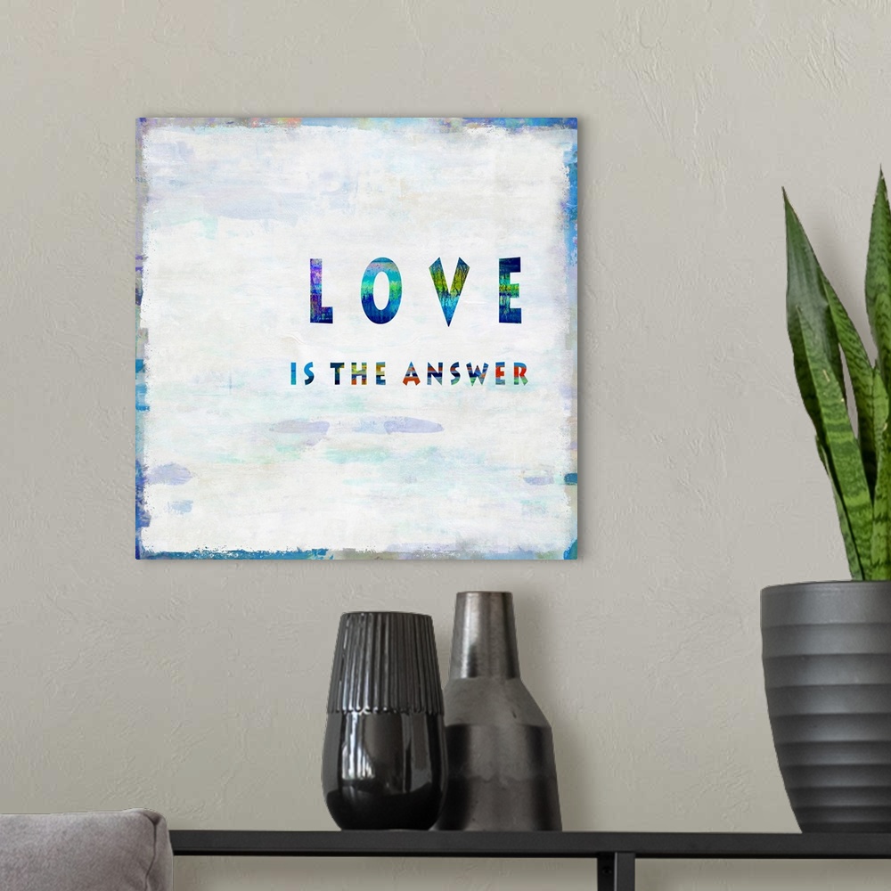 A modern room featuring "Love is the Answer"