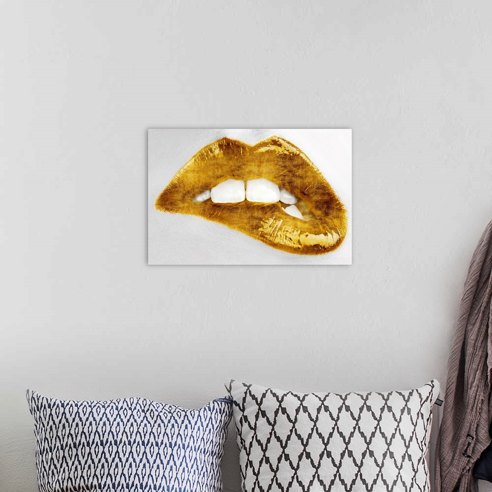 A bohemian room featuring Close up of a woman biting her lip with bright gold lipstick