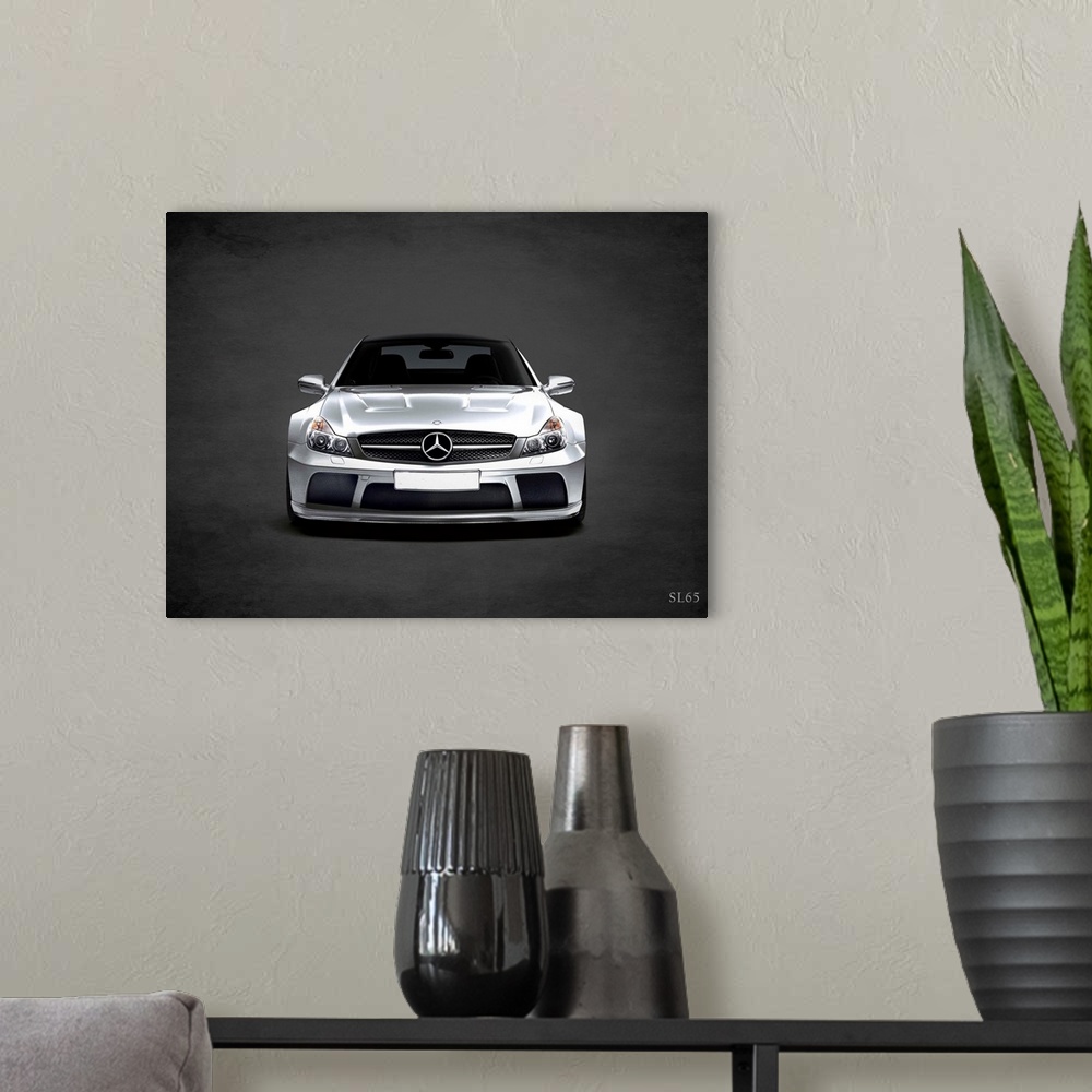 A modern room featuring Photograph of a silver Mercedes Benz SL65 printed on a black background with a dark vignette.