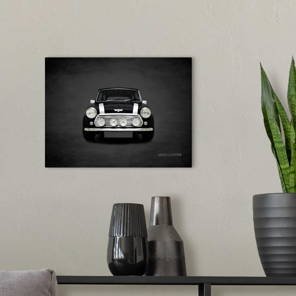 A modern room featuring Photograph of a black 2001 Mini Cooper with white stripes printed on a black background with a da...