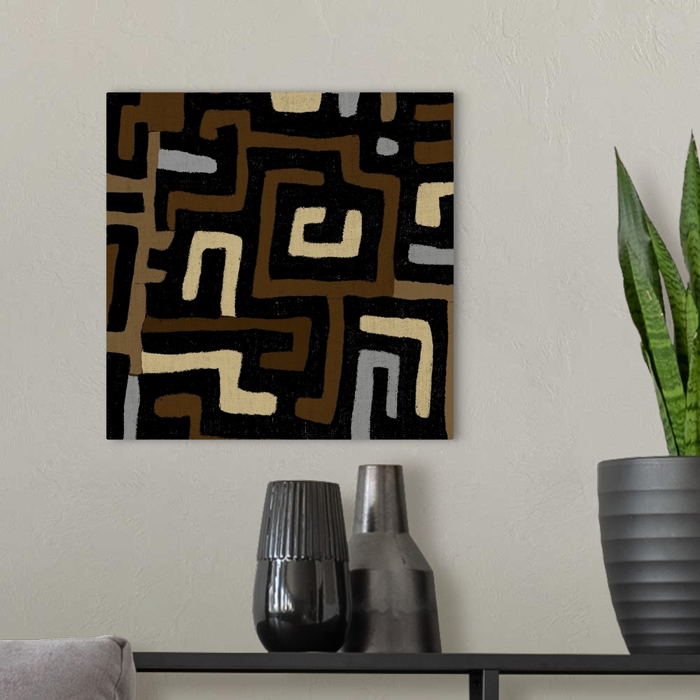 A modern room featuring Square abstract art created with patterned brown, tan, and gray lines.