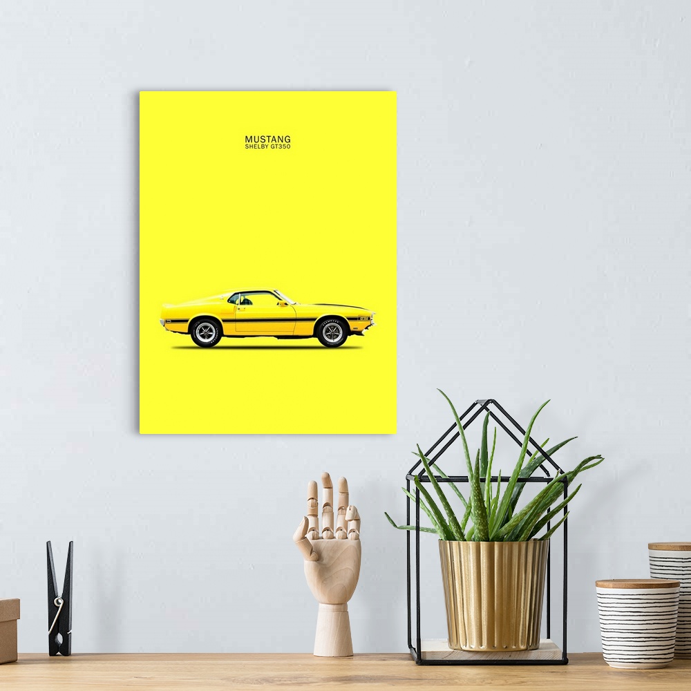 A bohemian room featuring Photograph of a yellow Mustang Shelby GT350 69 with a black stripe printed on a yellow background