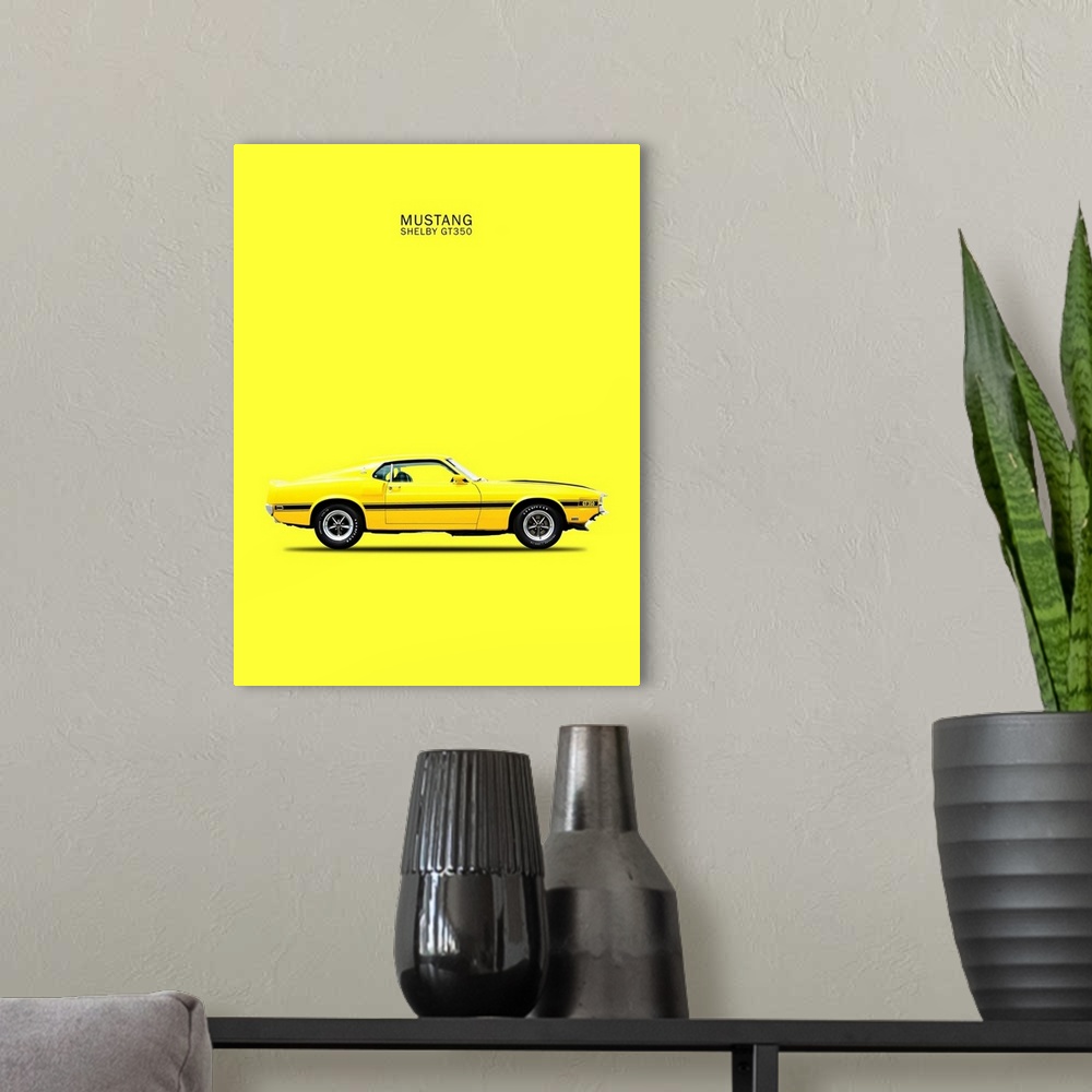 A modern room featuring Photograph of a yellow Mustang Shelby GT350 69 with a black stripe printed on a yellow background