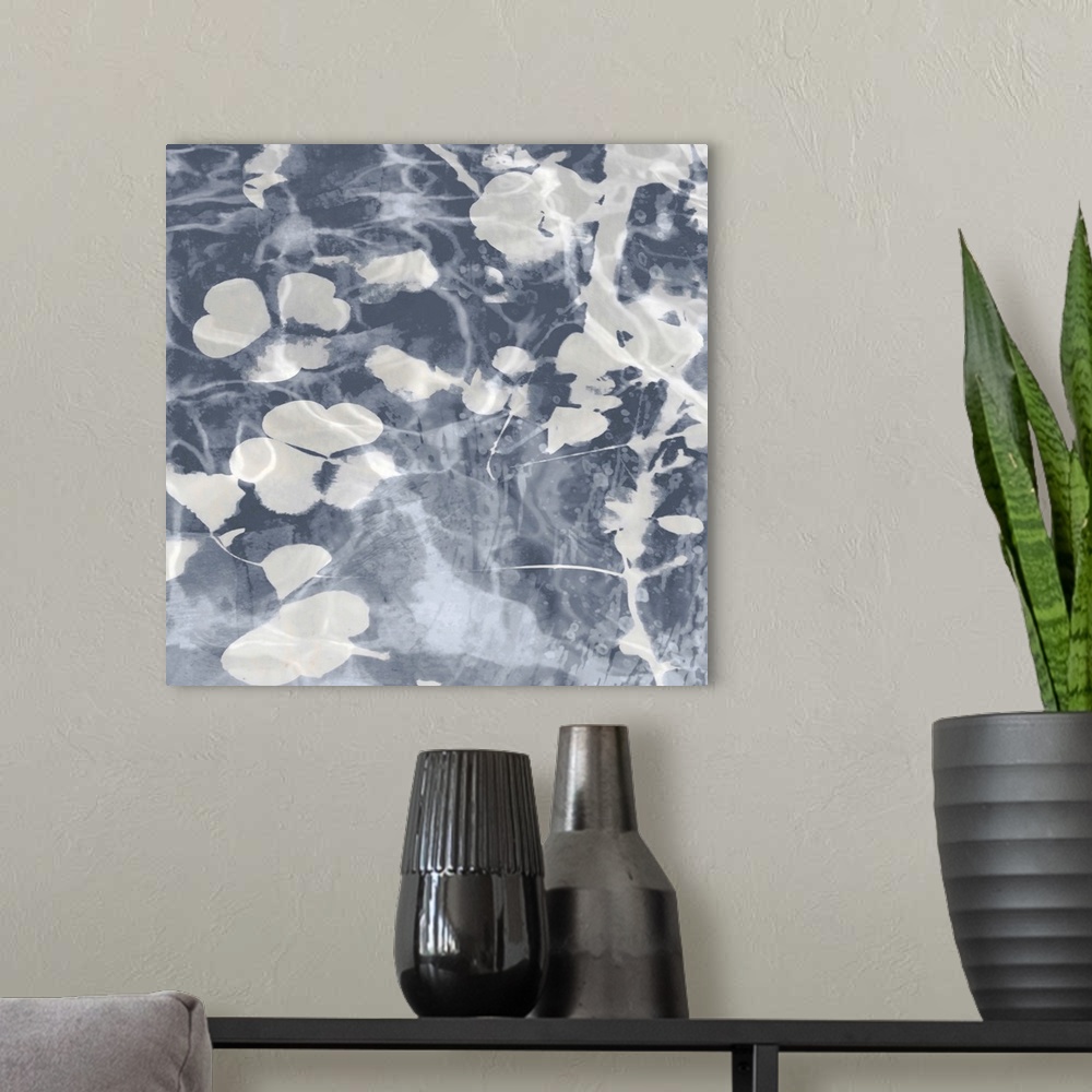 A modern room featuring Contemporary artwork featuring soft white petals over a mottled background in shades of gray.