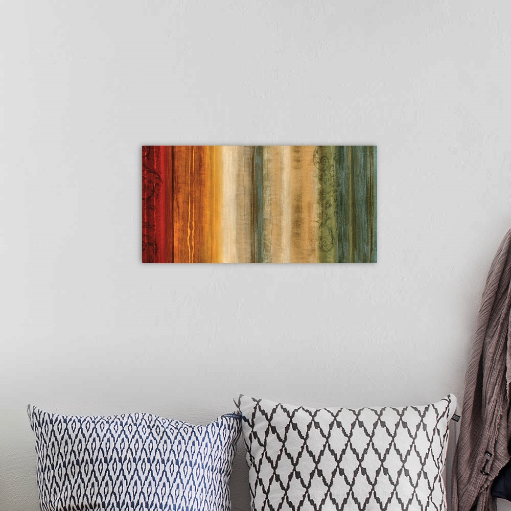 A bohemian room featuring Large abstract art with vertical lines of color in shades of red, yellow, cream, beige, green, an...