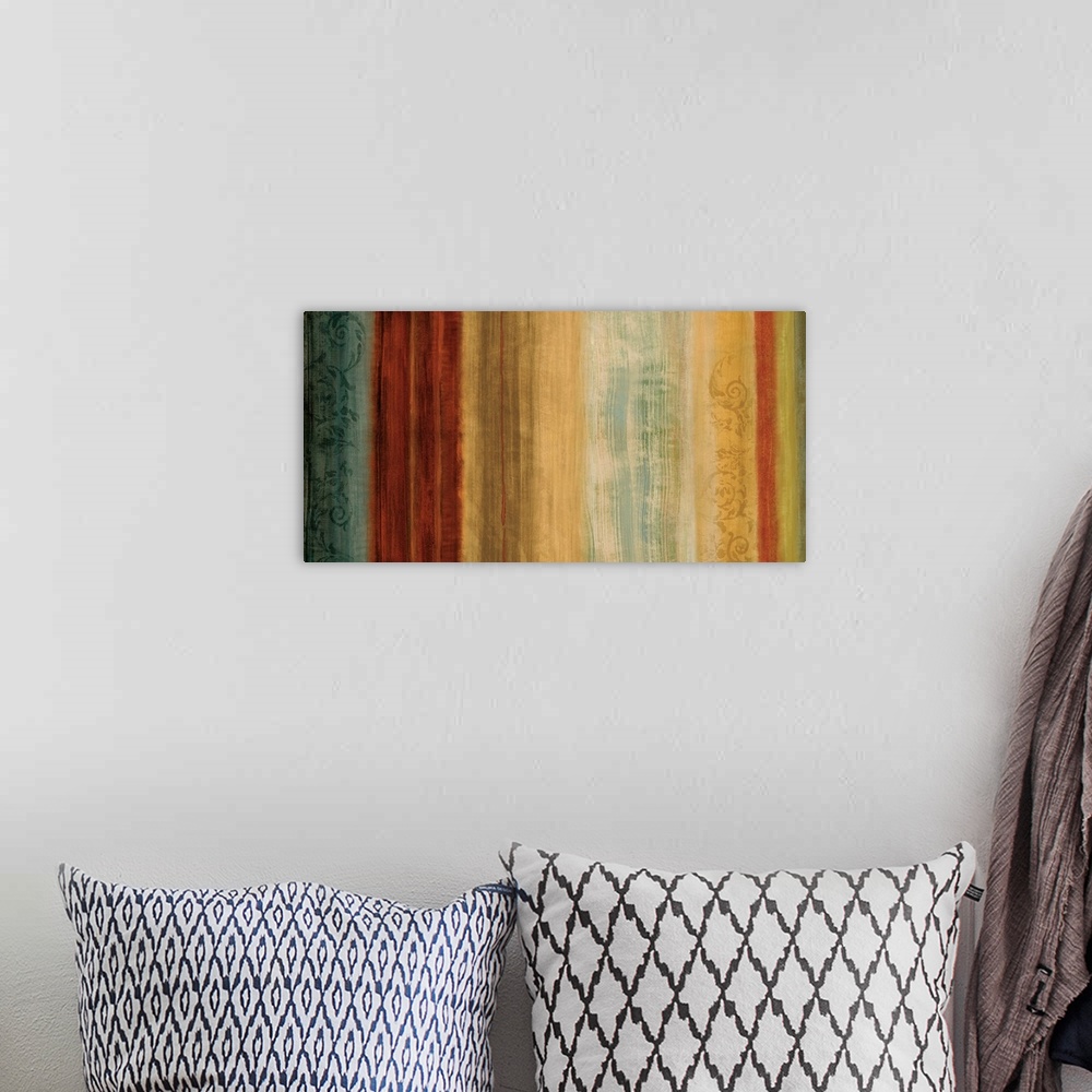 A bohemian room featuring Large abstract art with vertical lines of color in shades of red, yellow, cream, beige, green, an...