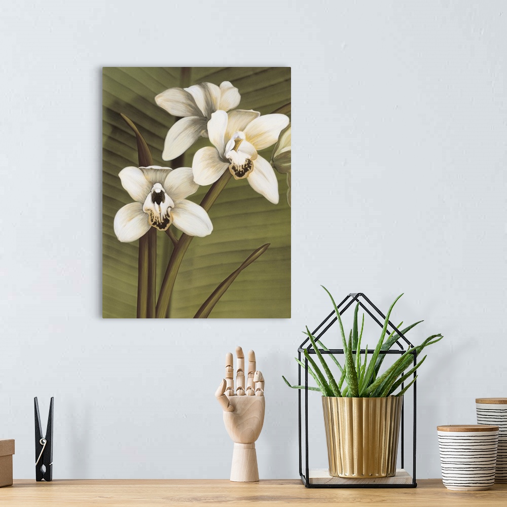 A bohemian room featuring Contemporary painting of three white orchids with a palm leaf background.