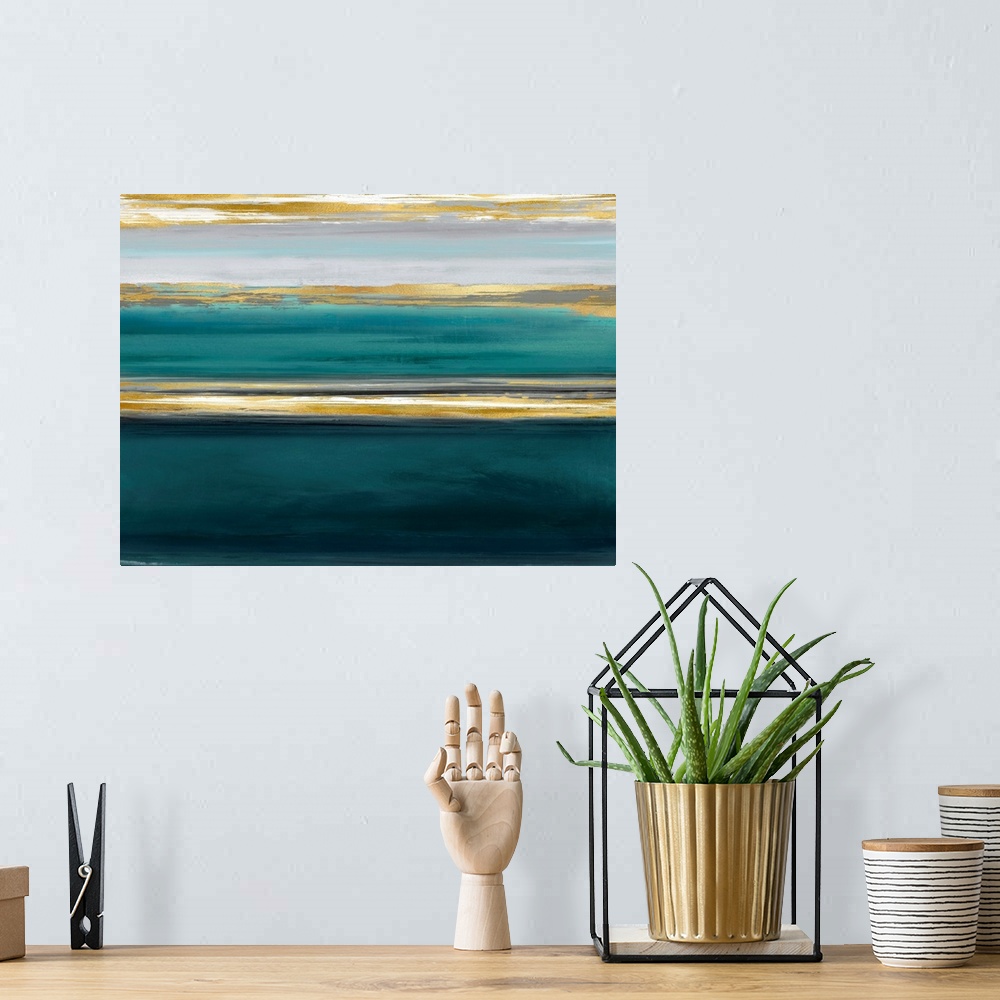 A bohemian room featuring Contemporary artwork featuring three gold brush strokes on a teal gradated background.
