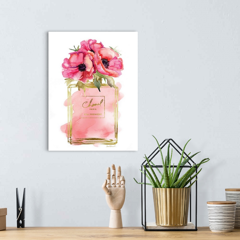 A bohemian room featuring A bottle of perfume filled with watercolor droplets and flowers as the topper.