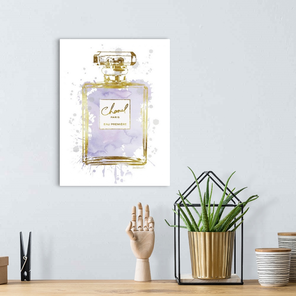 A bohemian room featuring A bottle of perfume filled with watercolor droplets.