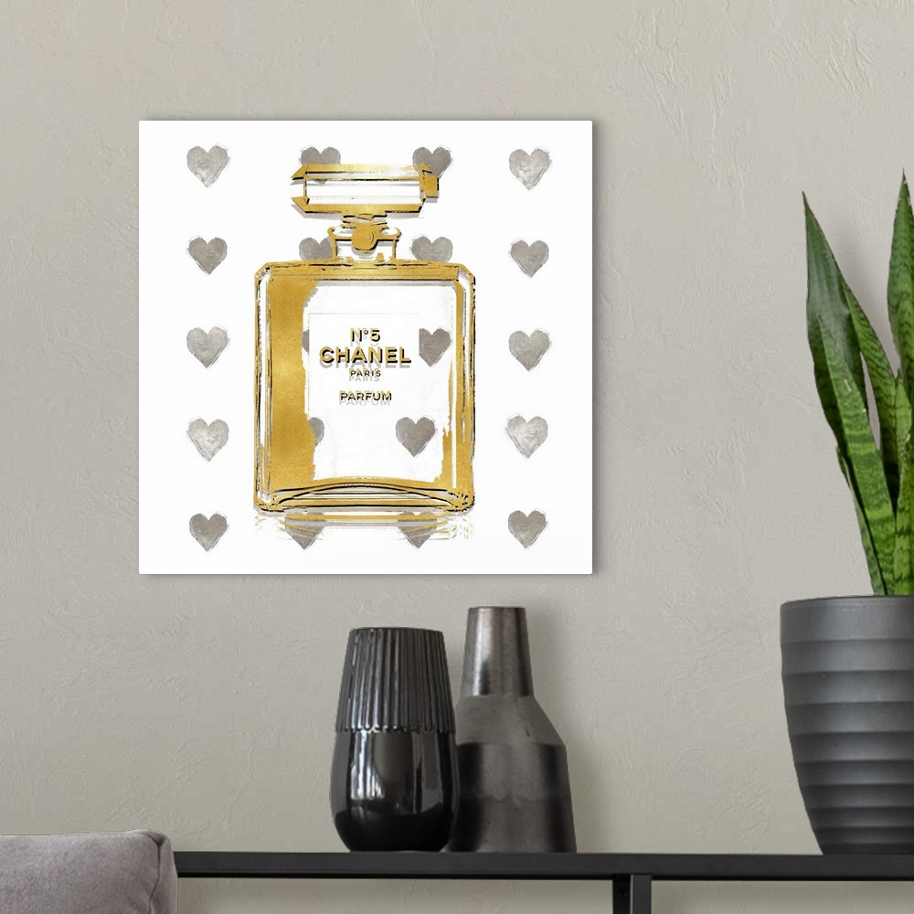 A modern room featuring A white background with hearts peek through a transparent bottle of perfume.