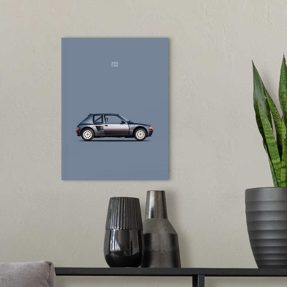 A modern room featuring Photograph of a slate blue-gray Peugeot 205 Turbo 1984 printed on a slate blue background