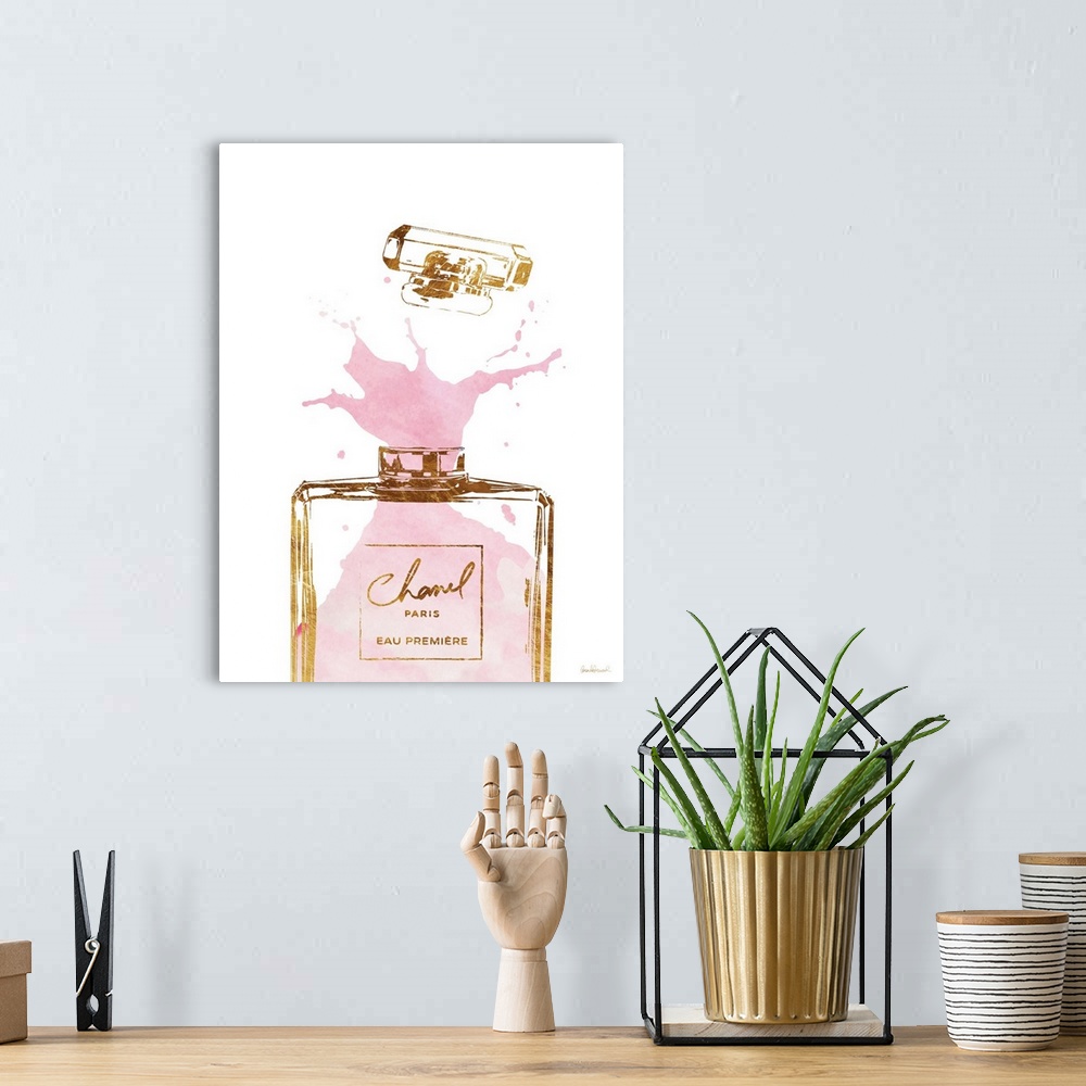 A bohemian room featuring A bottle of perfume spills out onto a white background.