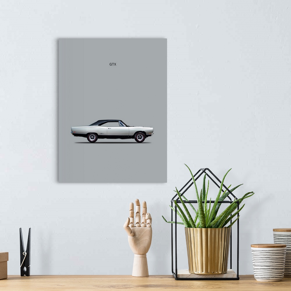 A bohemian room featuring Photograph of a silver Plymouth GTX Coupe 1969 printed on a silver background