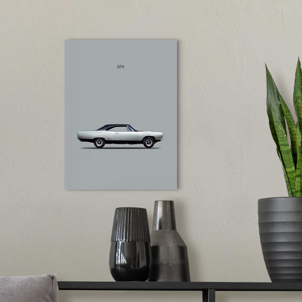 A modern room featuring Photograph of a silver Plymouth GTX Coupe 1969 printed on a silver background