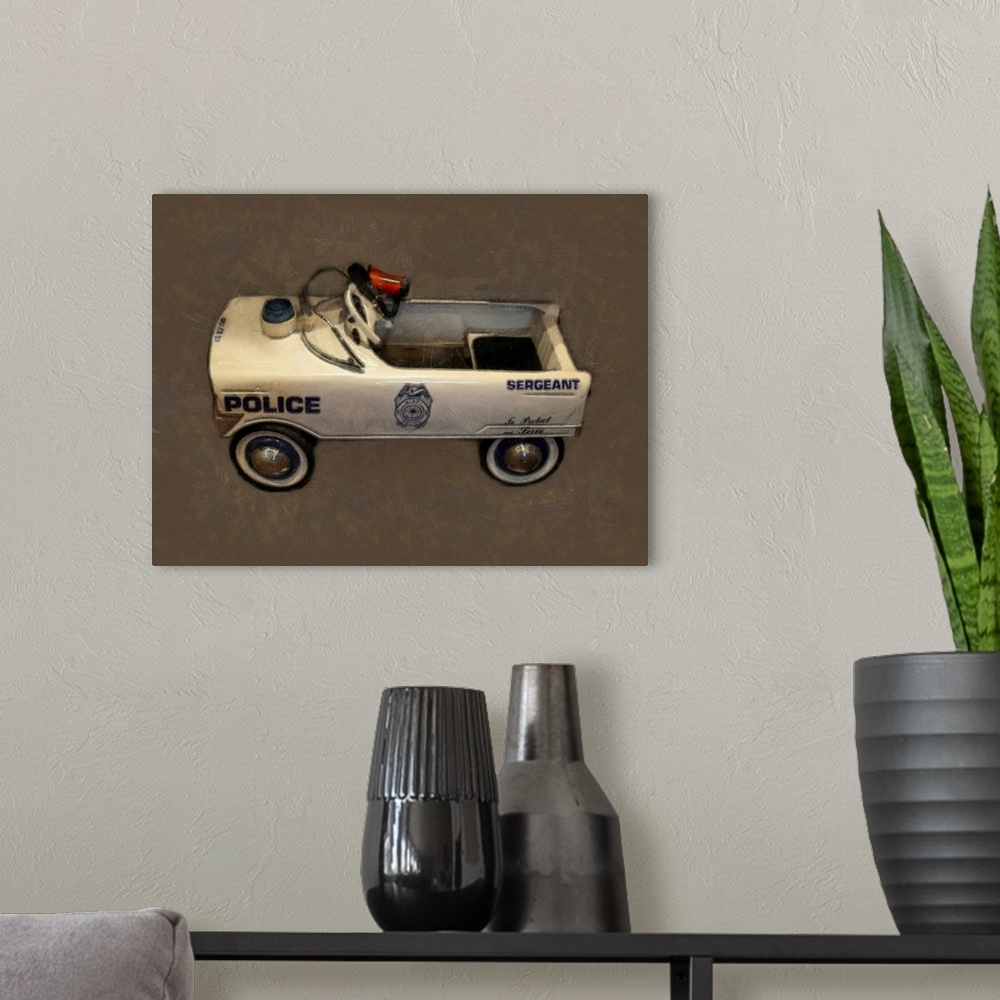 A modern room featuring Police Pedal Car