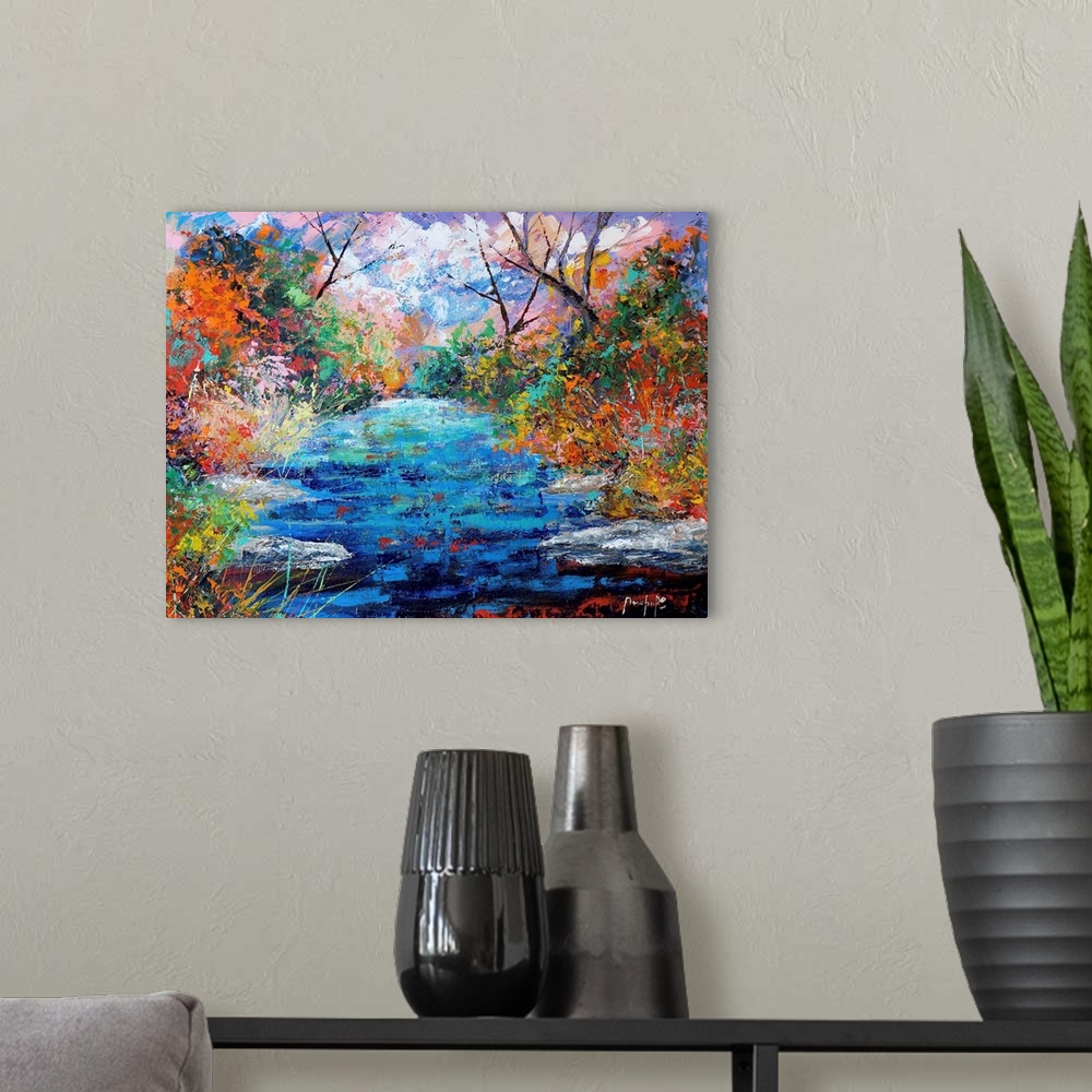 A modern room featuring Abstract landscape painting of a pond surrounded by colorful trees and sky, created with small, l...