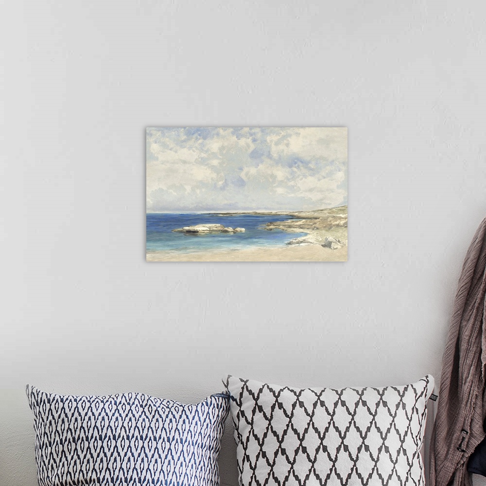 A bohemian room featuring Deep blue waters and fluffy clouds convey a sense of stillness to this contemporary artwork.