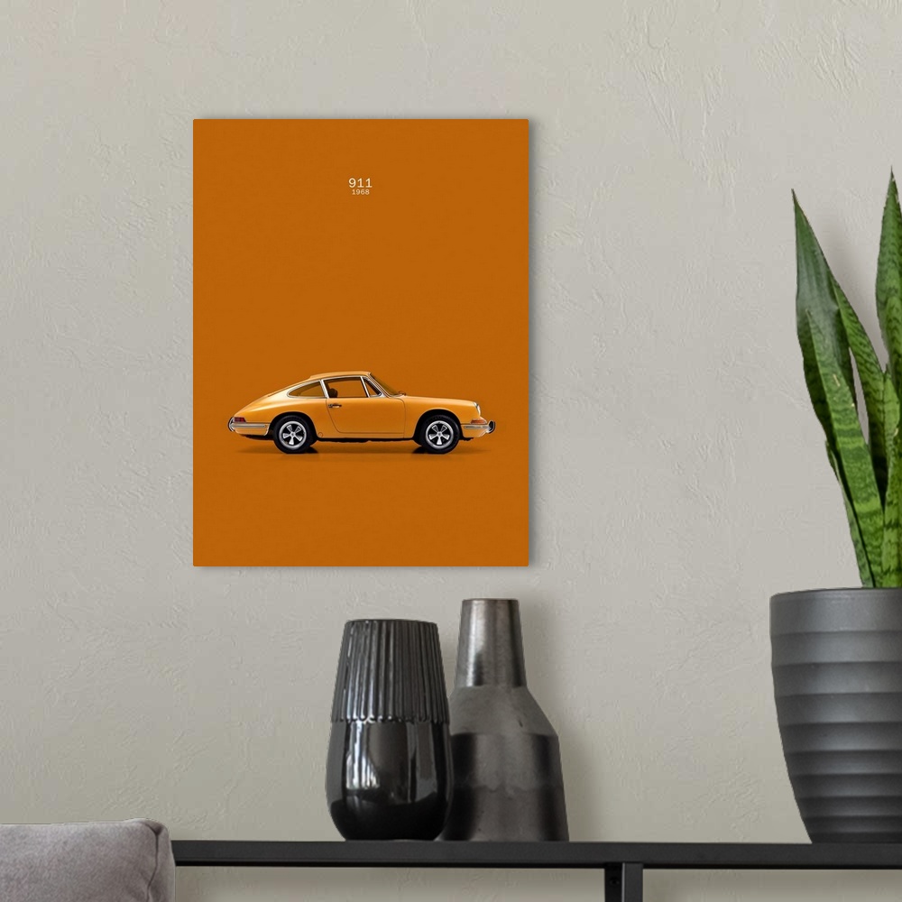 A modern room featuring Photograph of an orange Porsche 911 1968 printed on an orange background
