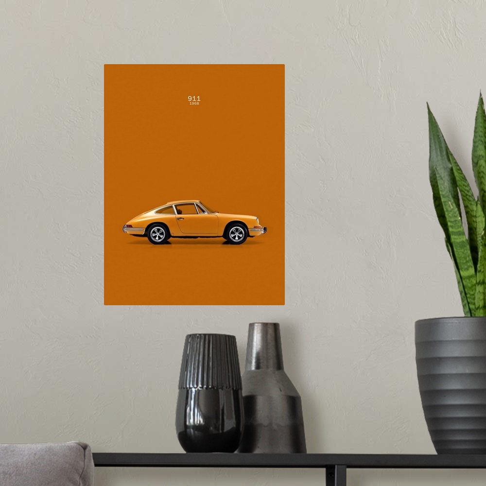 A modern room featuring Photograph of an orange Porsche 911 1968 printed on an orange background