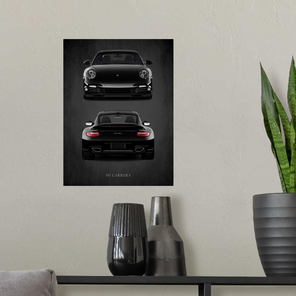 A modern room featuring Photograph of the front and back view of a black Porsche 911 Carrera Turbo printed on a black bac...