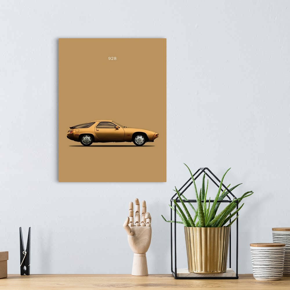A bohemian room featuring Photograph of a gold Porsche 928 1979 printed on a gold background