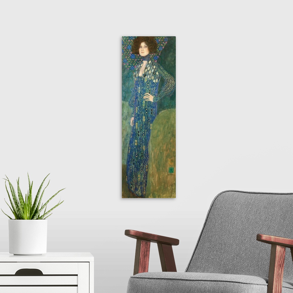 A modern room featuring Vertical portrait of a woman wearing a dress with beautiful shapes.