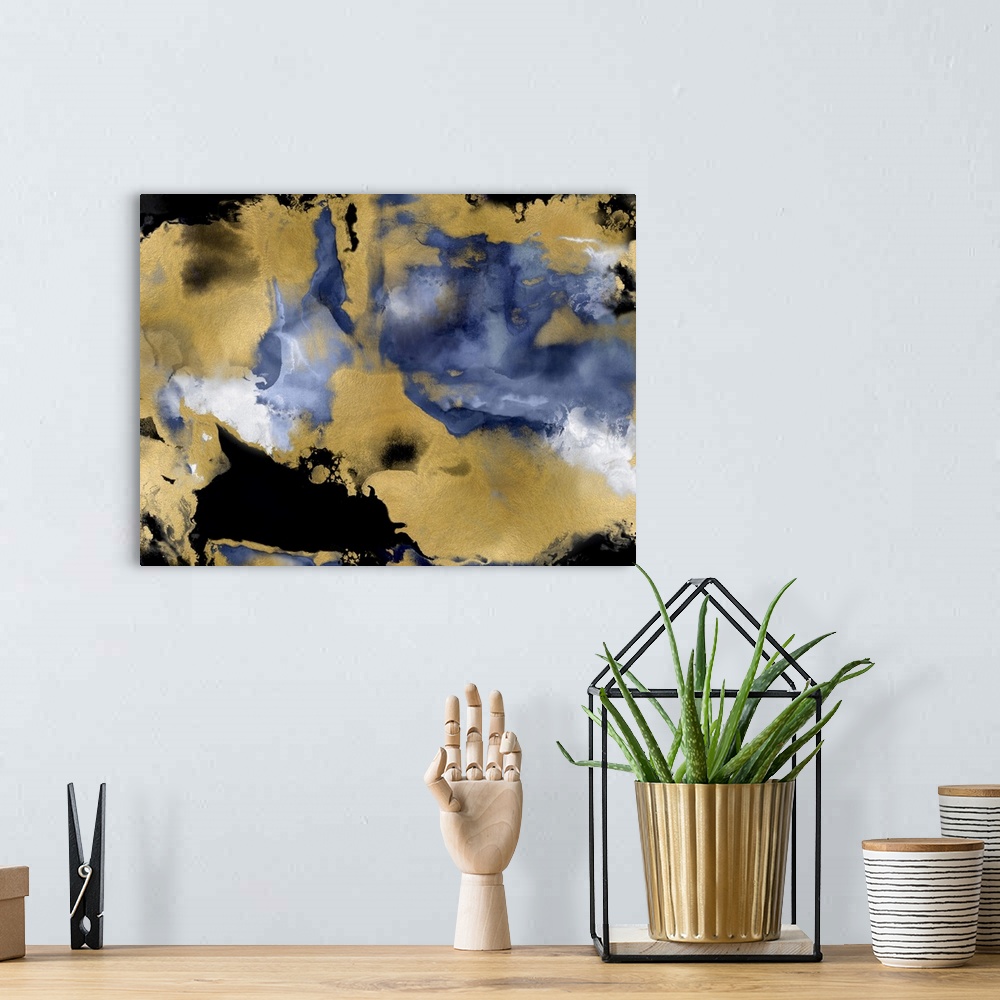 A bohemian room featuring Abstract painting with black and metallic gold on an indigo and white background.
