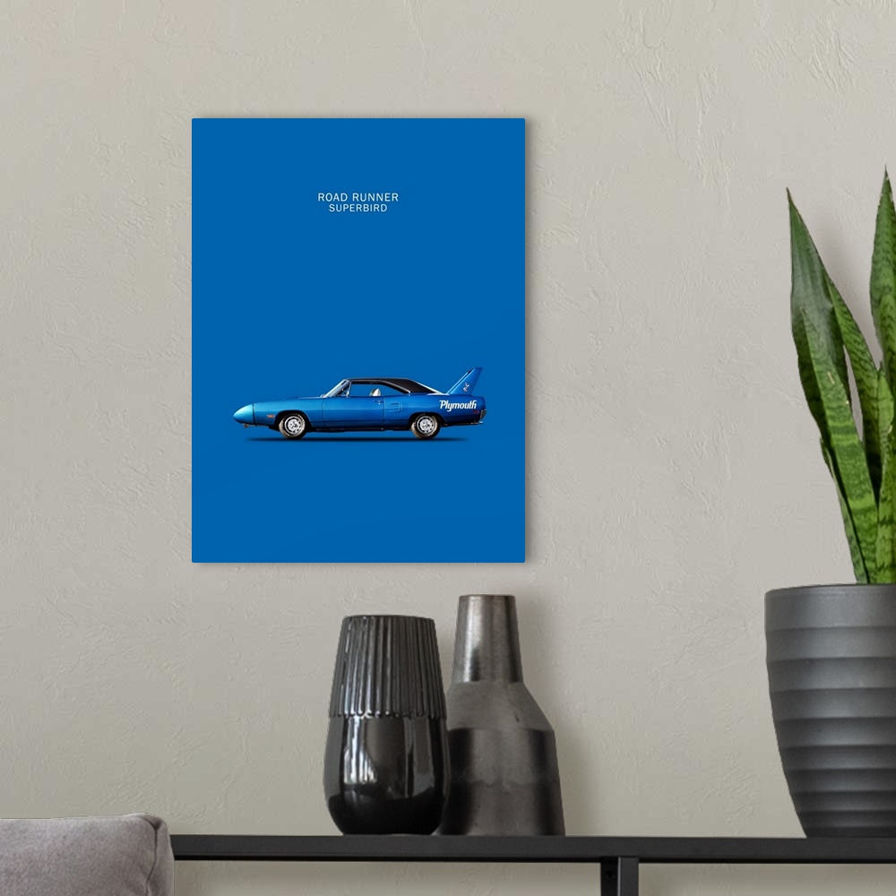 A modern room featuring Photograph of a blue Road-Runner Superbird 1970 printed on a blue background