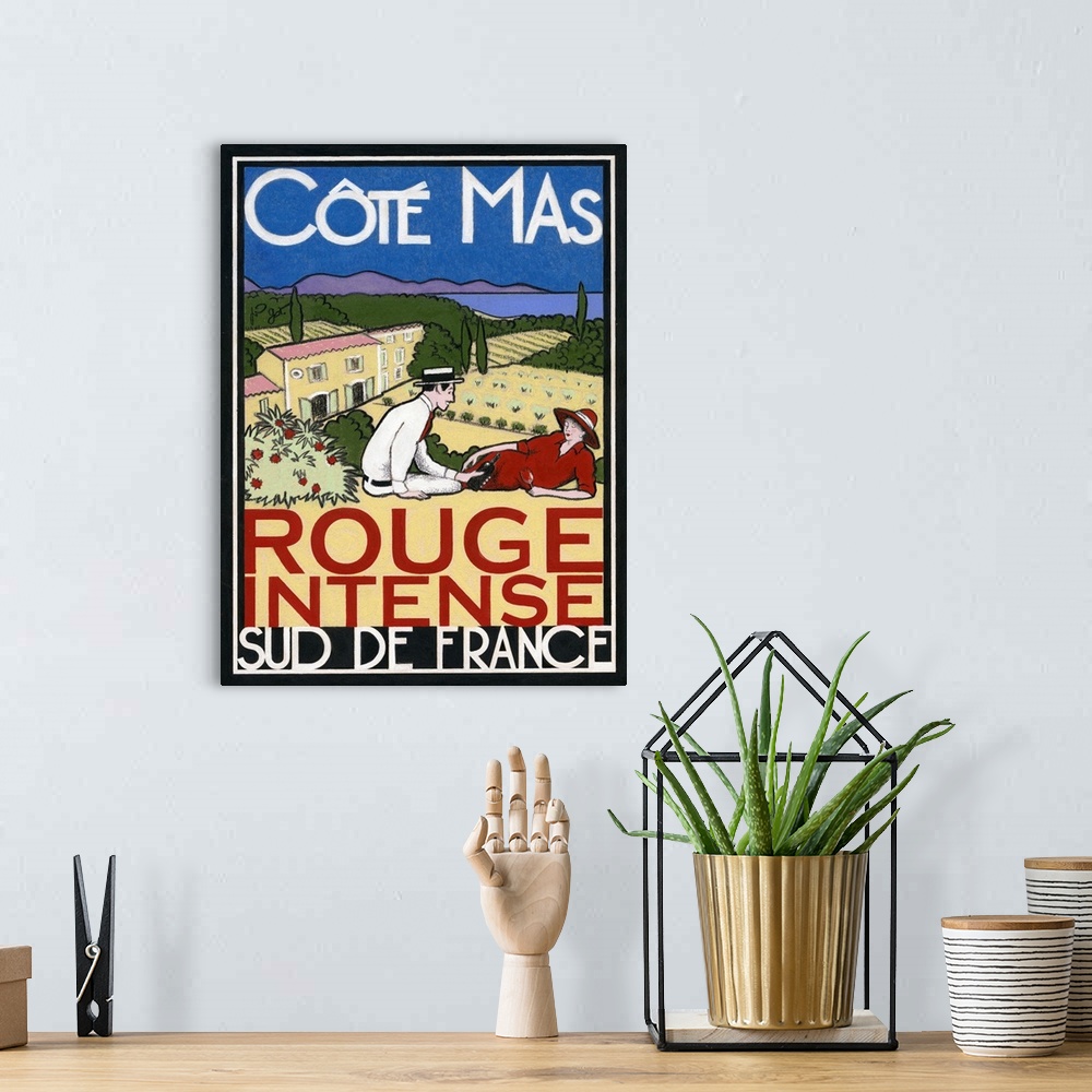 A bohemian room featuring Vintage French poster advertisement.