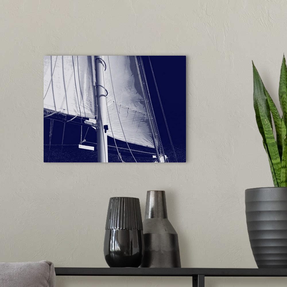 A modern room featuring Indigo and white illustration of a sail from a sailboat.